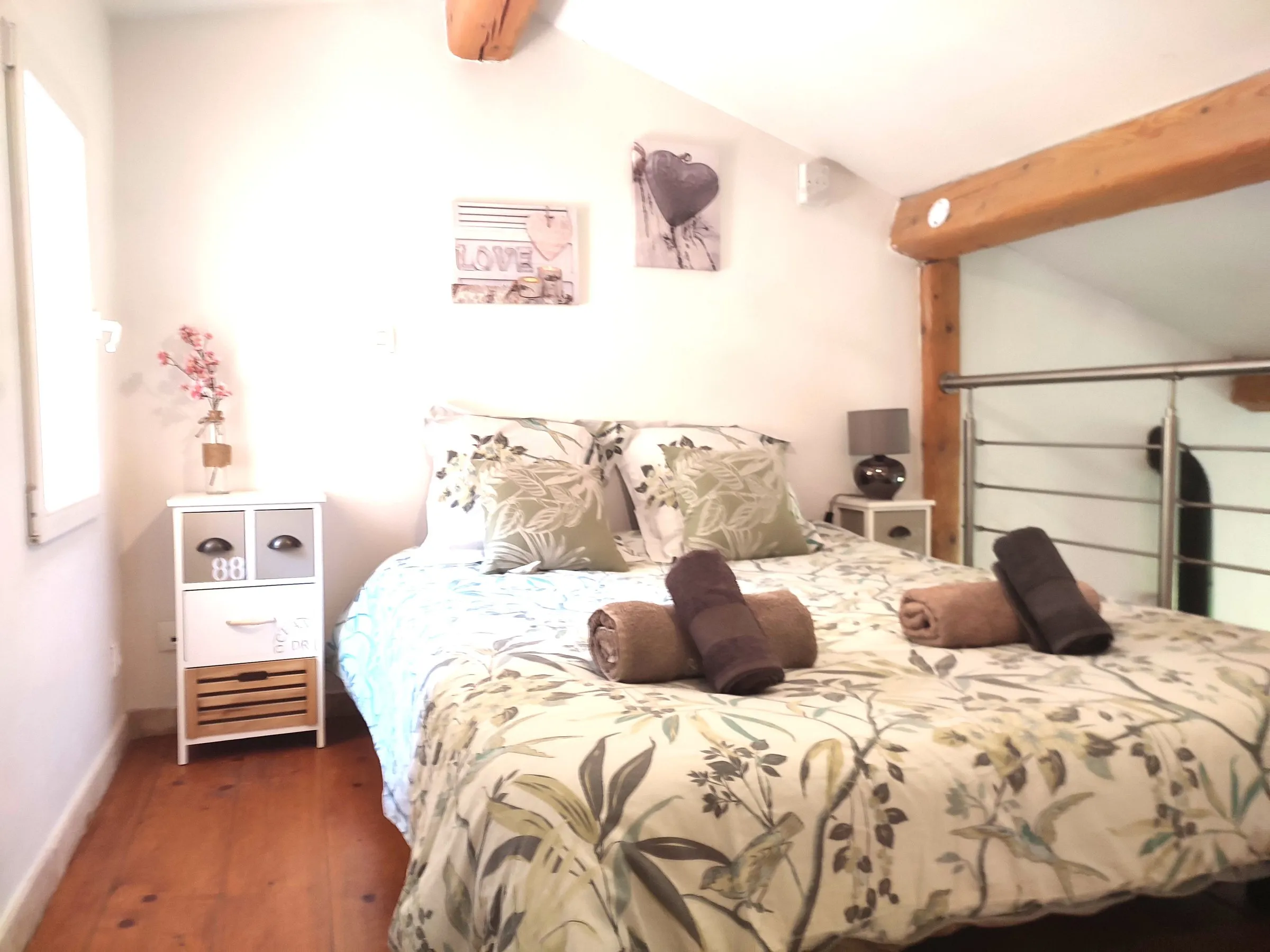 Attic bedroom with wooden floor